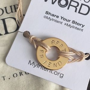 Best Friend my Intent gold charm on cream cord